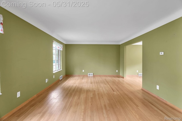 2408 Otter St, Warren, MI 48092 - empty room with light wood-type flooring and baseboards