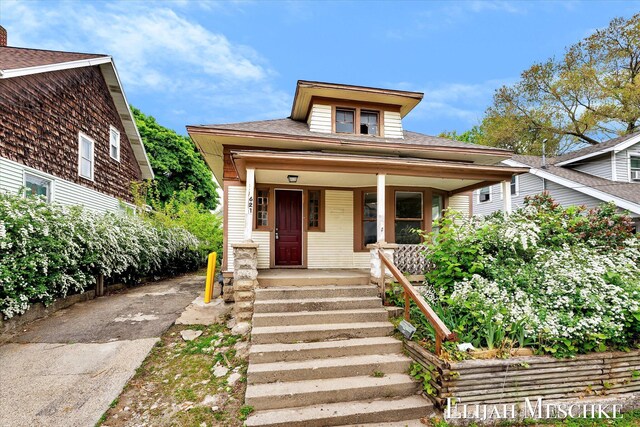 621 Olympia St SW, Grand Rapids, MI 49503 - bungalow with covered porch and roof with shingles