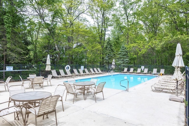 18774 Old Field Rd, New Buffalo, MI 49117 - community pool with a patio area and view of scattered trees