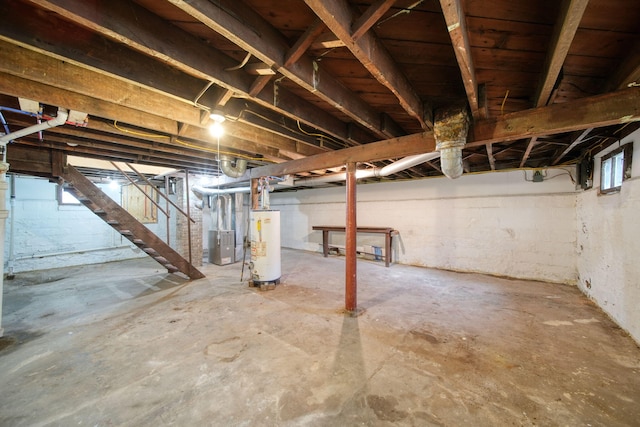 130 N Horton St, Jackson, MI 49202 - unfinished below grade area featuring gas water heater and heating unit