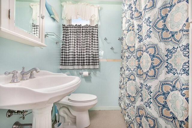 614 Marshall Rd, Coldwater, MI 49036 - full bath featuring toilet and a shower with shower curtain
