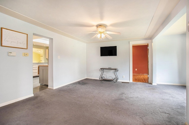 614 Marshall Rd, Coldwater, MI 49036 - carpeted empty room featuring ceiling fan and baseboards