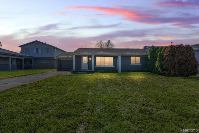 48306 Jefferson Ave, Chesterfield, MI 48047 - ranch-style home with asphalt driveway, a yard, and a garage