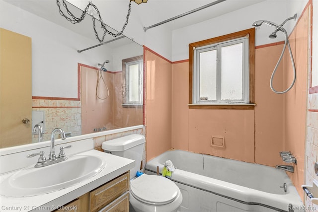 25960 Yale St, Inkster, MI 48141 - full bathroom with toilet, vanity, bathing tub / shower combination, wainscoting, and tile walls