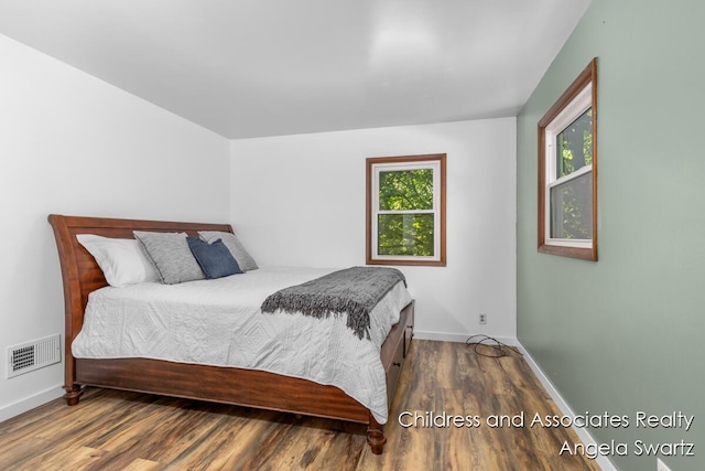 1328 S Montgomery St, Hastings, MI 49058 - bedroom with wood finished floors and baseboards