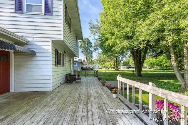 1328 S Montgomery St, Hastings, MI 49058 - wooden terrace with a yard