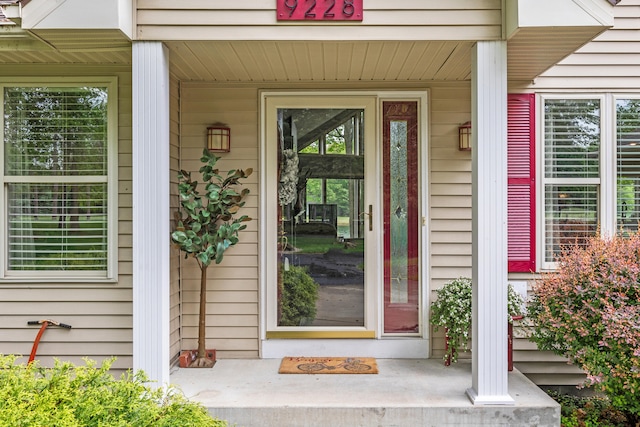 9228 Main St, Canadian Lakes, MI 49346 - entrance to property featuring a porch