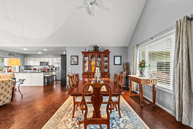 9228 Main St, Canadian Lakes, MI 49346 - dining area featuring dark wood-style floors, ceiling fan, high vaulted ceiling, recessed lighting, and baseboards