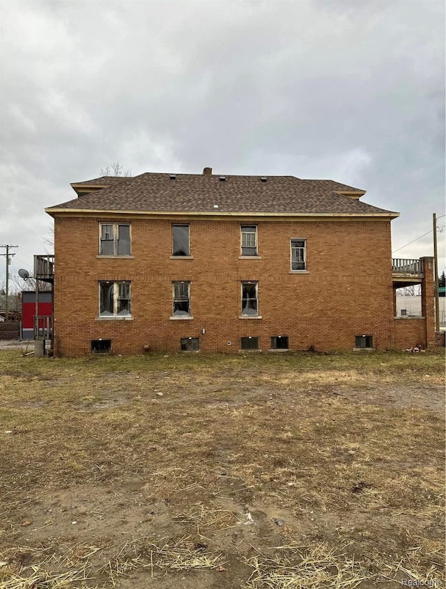 13408 E Mcnichols Rd, Detroit, MI 48205 - back of house with roof with shingles