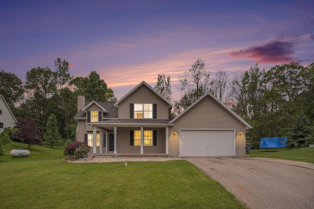 13860 Rolling Creek Dr, Lowell, MI 49331 - traditional home featuring asphalt driveway, an attached garage, a chimney, a lawn, and covered porch