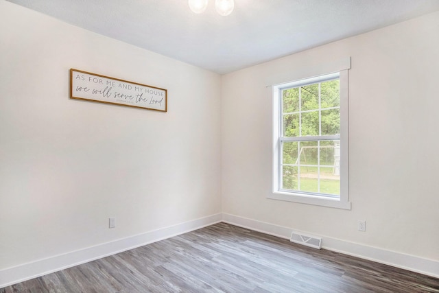 13860 Rolling Creek Dr, Lowell, MI 49331 - unfurnished room with baseboards and dark wood finished floors
