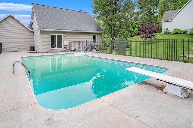 13860 Rolling Creek Dr, Lowell, MI 49331 - view of swimming pool featuring a patio and a diving board