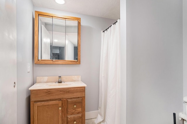 13860 Rolling Creek Dr, Lowell, MI 49331 - full bath featuring vanity, curtained shower, toilet, and baseboards