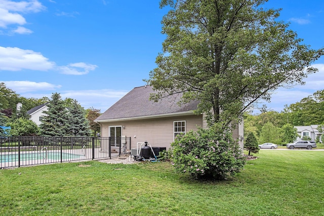 13860 Rolling Creek Dr, Lowell, MI 49331 - rear view of property with a shingled roof