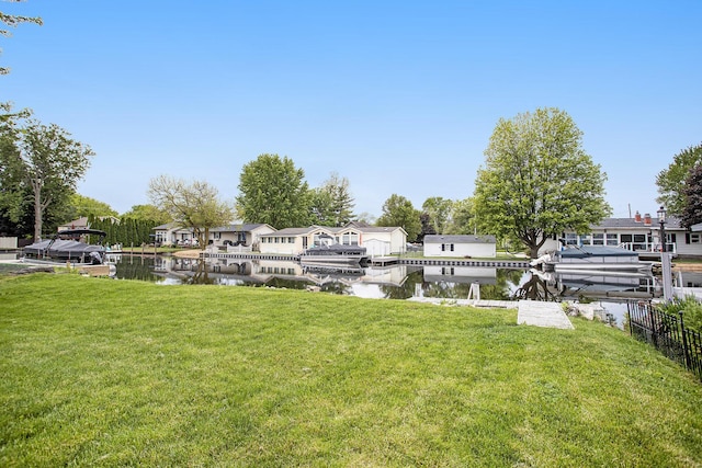 12657 Blue Lagoon Rd, Shelbyville, MI 49344 - view of green lawn with a water view and a residential view