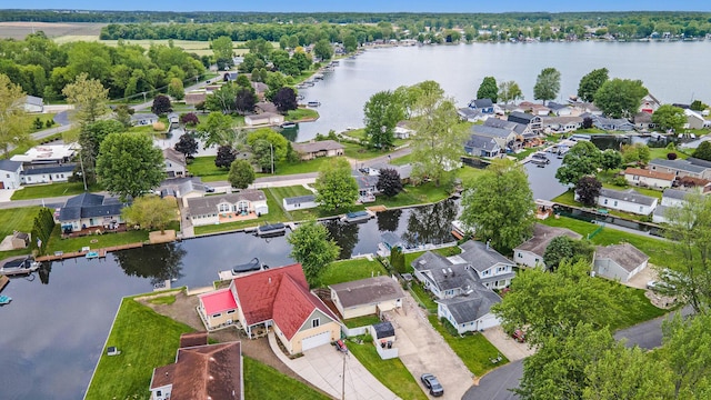 12657 Blue Lagoon Rd, Shelbyville, MI 49344 - aerial perspective of suburban area featuring a large body of water