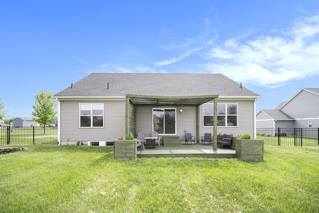 2842 Tall Grass Dr, Grass Lake, MI 49240 - back of property with a patio, a shingled roof, and an outdoor living space
