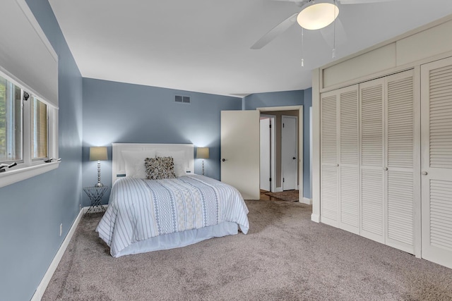1102 S Durand St, Jackson, MI 49203 - carpeted bedroom featuring baseboards, ceiling fan, and a closet