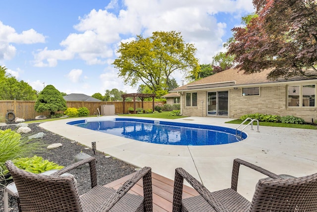 1102 S Durand St, Jackson, MI 49203 - view of pool with a fenced backyard, a patio, and a pergola