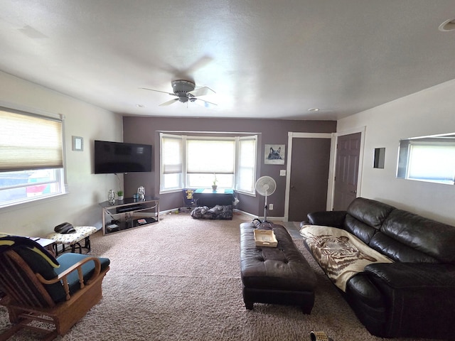 617 Stoll Rd, Lansing, MI 48917 - carpeted living room with a ceiling fan