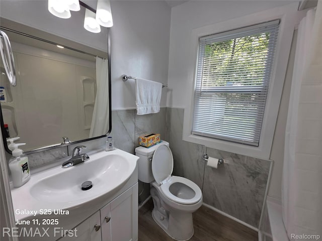 12725 Riverview St, Detroit, MI 48223 - bathroom featuring vanity, wood finished floors, and shower / bath combo with shower curtain
