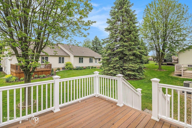 6063 Steeplechase Dr, Grand Blanc, MI 48439 - deck with a yard and central AC