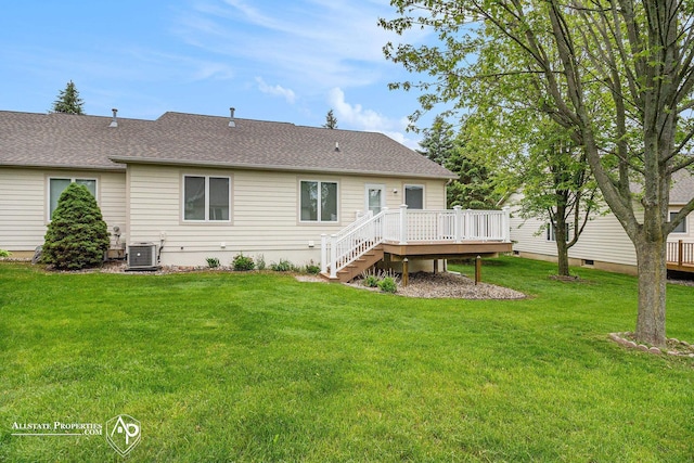 6063 Steeplechase Dr, Grand Blanc, MI 48439 - rear view of house featuring a deck, central air condition unit, a lawn, and stairway