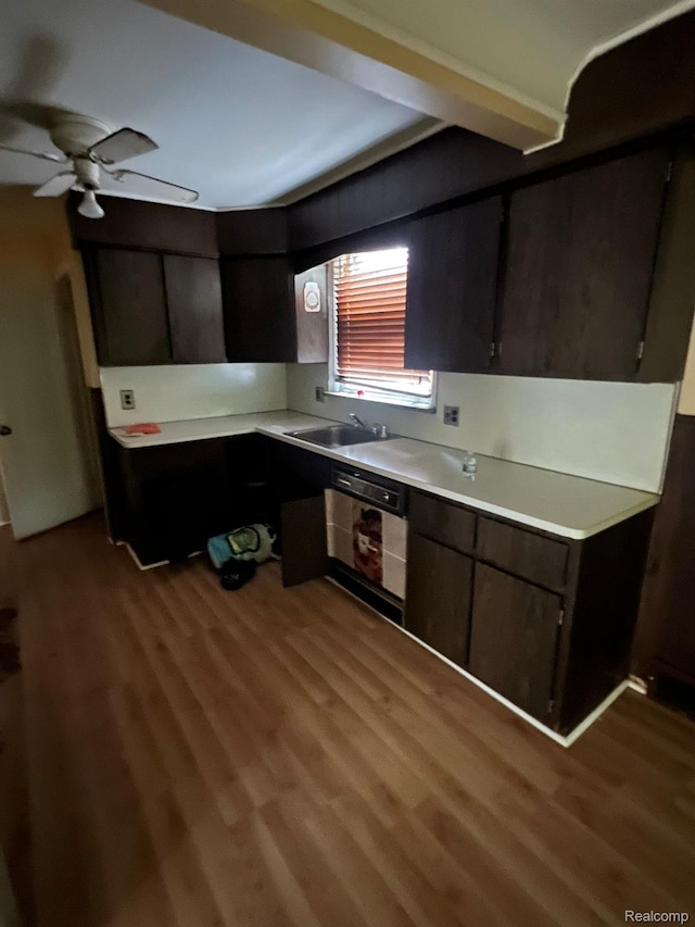 20258 Fairport St, Detroit, MI 48205 - kitchen with a sink, wood finished floors, light countertops, a ceiling fan, and wall oven