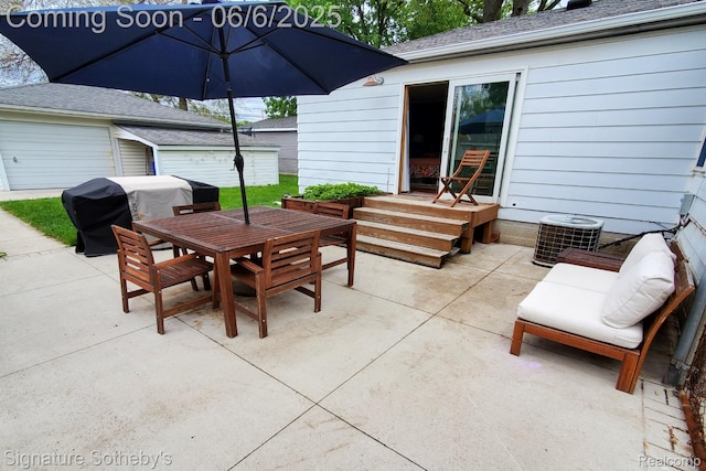917 N Edison Ave, Royal Oak, MI 48067 - view of patio / terrace featuring a grill, outdoor dining area, and an outbuilding