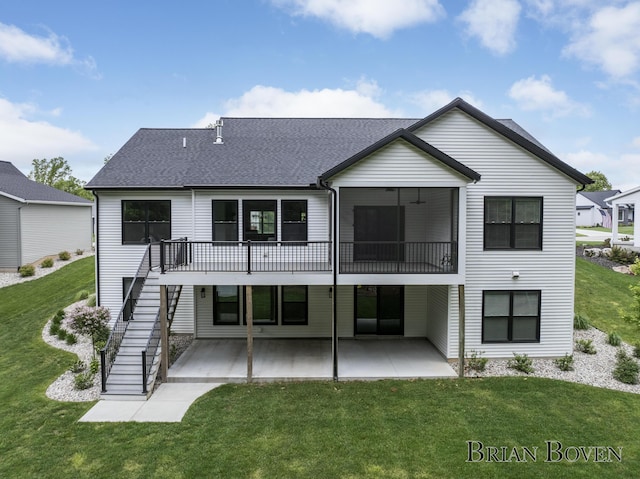 4846 Honeycrisp Dr NE, Rockford, MI 49341 - back of property with stairs, a patio, a lawn, a deck, and a shingled roof