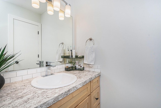 3360 Brook Trl SE, Grand Rapids, MI 49508 - bathroom with vanity and decorative backsplash