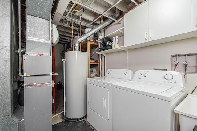 3360 Brook Trl SE, Grand Rapids, MI 49508 - laundry area featuring water heater, washer and clothes dryer, cabinet space, and heating unit