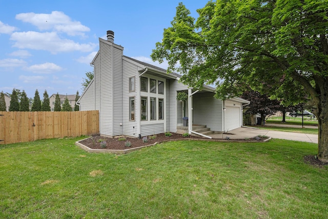 3360 Brook Trl SE, Grand Rapids, MI 49508 - view of front of home with driveway, a chimney, and a garage