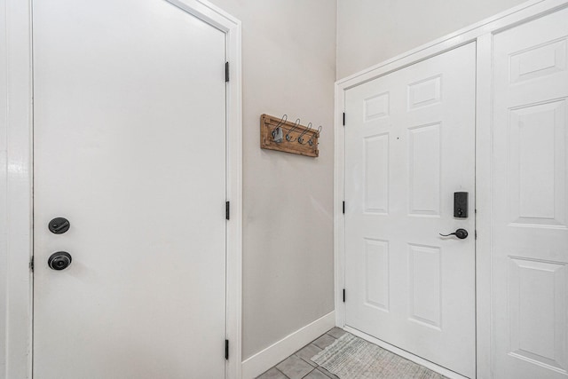 3360 Brook Trl SE, Grand Rapids, MI 49508 - doorway to outside featuring baseboards