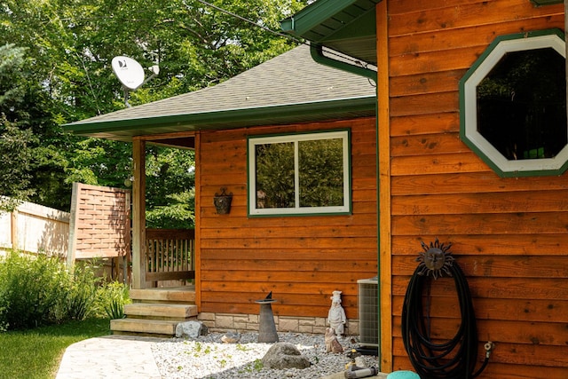 376 Highview Rd, Traverse City, MI 49696 - view of side of property with roof with shingles