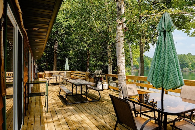 376 Highview Rd, Traverse City, MI 49696 - wooden terrace featuring outdoor dining area and grilling area
