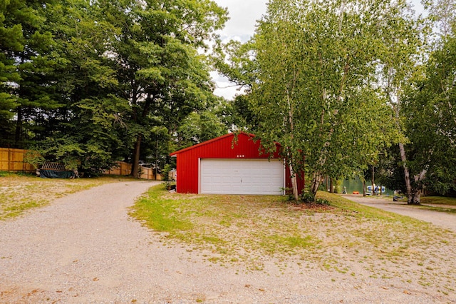 376 Highview Rd, Traverse City, MI 49696 - detached garage featuring view of scattered trees