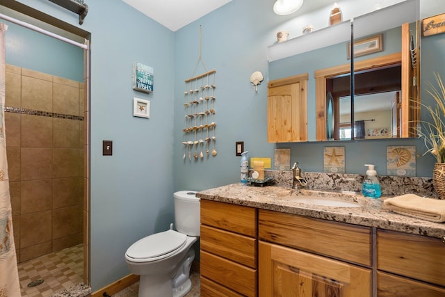 376 Highview Rd, Traverse City, MI 49696 - bathroom featuring vanity, a stall shower, and toilet