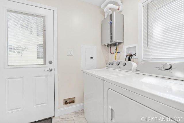 180 Maple St, Sparta, MI 49345 - laundry room with tankless water heater, electric panel, independent washer and dryer, light marble finish flooring, and baseboards