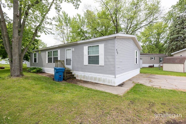 229 Spear St SW, Grand Rapids, MI 49548 - manufactured / mobile home featuring a front yard
