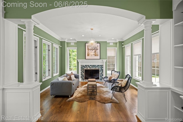 6212 Bromley Ct, West Bloomfield, MI 48322 - living room with ornate columns, wood finished floors, recessed lighting, and crown molding