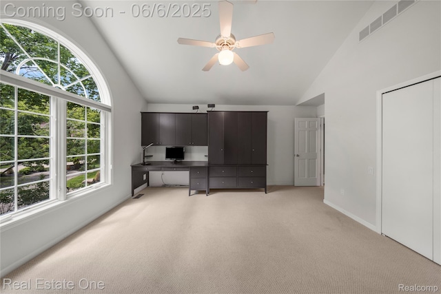 6212 Bromley Ct, West Bloomfield, MI 48322 - home office featuring light colored carpet, plenty of natural light, ceiling fan, high vaulted ceiling, and baseboards