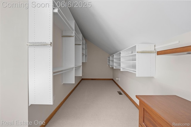 6212 Bromley Ct, West Bloomfield, MI 48322 - walk in closet with vaulted ceiling and light colored carpet