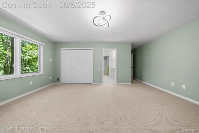 6212 Bromley Ct, West Bloomfield, MI 48322 - unfurnished bedroom featuring baseboards, carpet, and a closet