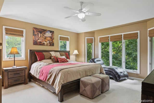 3468 High Hillcrest Dr, Howell, MI 48843 - bedroom with light colored carpet, multiple windows, a ceiling fan, and lofted ceiling