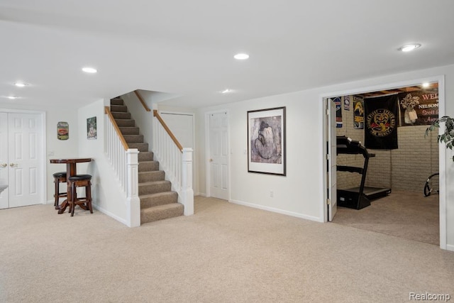 3468 High Hillcrest Dr, Howell, MI 48843 - finished below grade area featuring carpet, stairs, recessed lighting, and baseboards