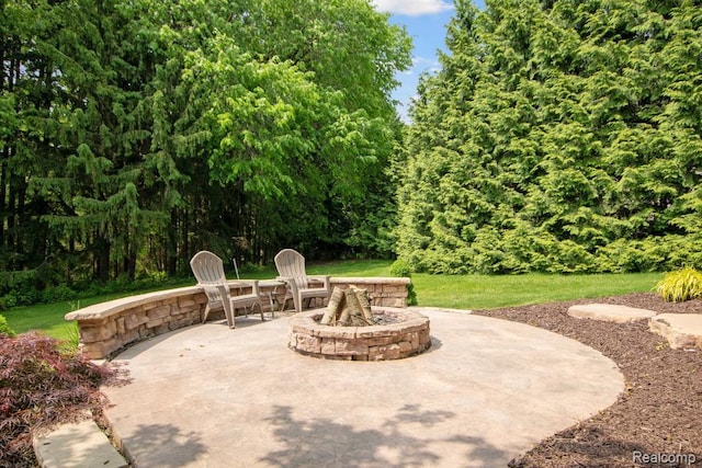 3468 High Hillcrest Dr, Howell, MI 48843 - view of patio / terrace featuring an outdoor fire pit