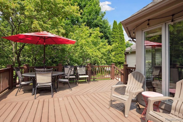 3468 High Hillcrest Dr, Howell, MI 48843 - wooden deck with outdoor dining space