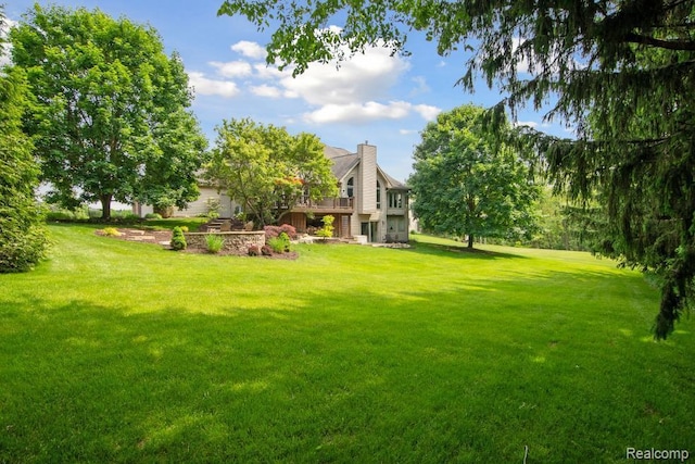 3468 High Hillcrest Dr, Howell, MI 48843 - view of green lawn with a wooden deck