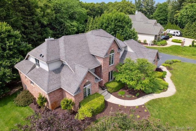 3468 High Hillcrest Dr, Howell, MI 48843 - aerial view of property and surrounding area featuring a forest